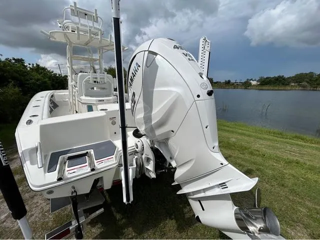 Slide: The Image of 2025 Pathfinder 2700 Open boat with powerful 450 V8 engine displayed outdoors. - 5