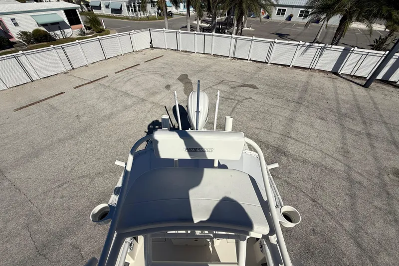 Slide: The Image of 2025 Pathfinder 2700 Open boat parked in a fenced area, top view. - 50