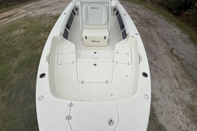 Slide: The Image of 2025 Pathfinder 2400 TRS boat interior, featuring spacious seating and storage compartments. - 19