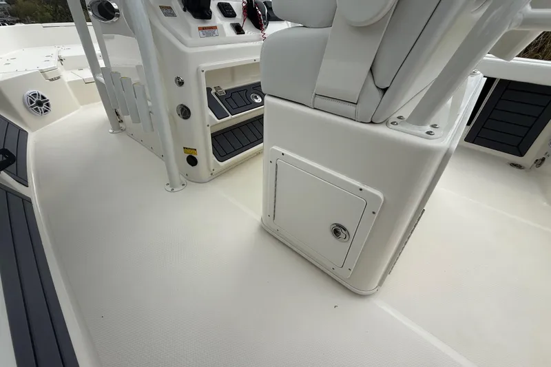 Slide: The Image of 2025 Pathfinder 2400 TRS boat interior, featuring seating and storage compartments. - 35