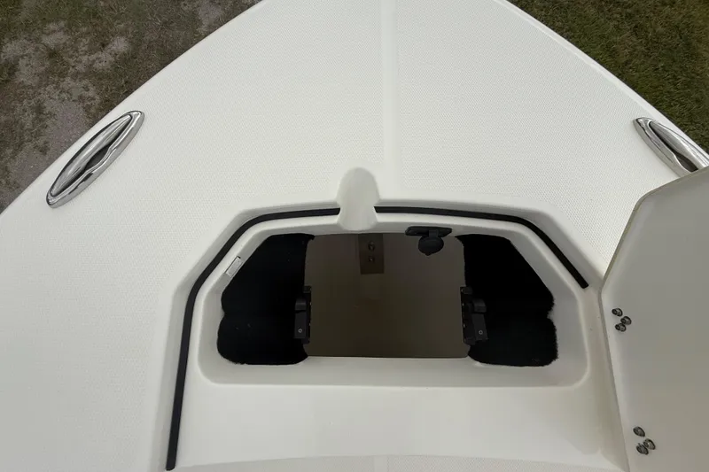 Slide: The Image of Open storage compartment on 2025 Pathfinder 2400 TRS boat deck. - 50