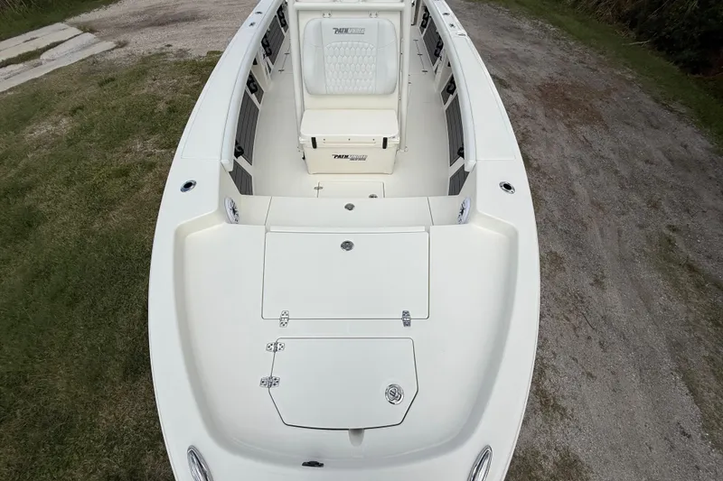 Slide: The Image of 2025 Pathfinder 2400 Open boat interior, featuring spacious seating and storage compartments. - 20