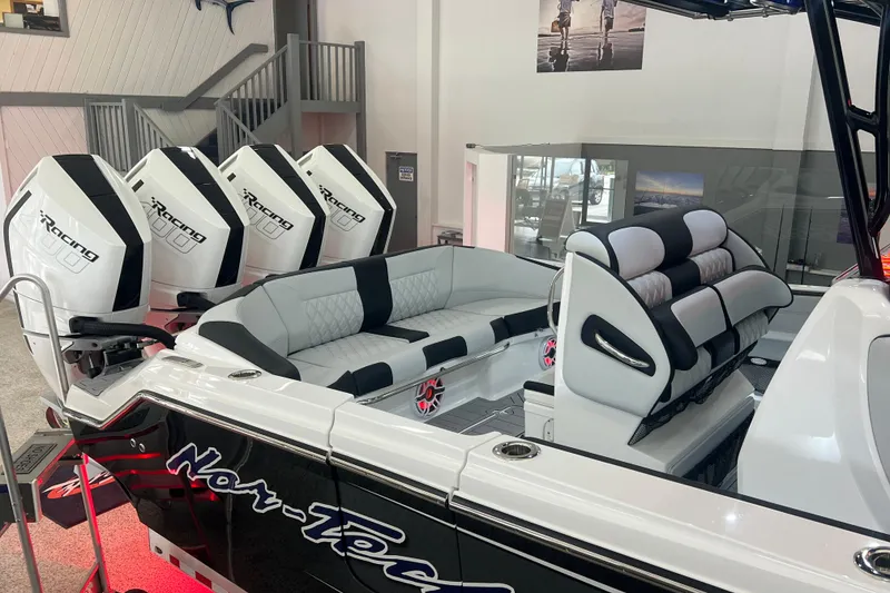 Slide: The Image of 2026 Nor-Tech 390 Sport Center Console with quad engines and luxurious seating. - 13