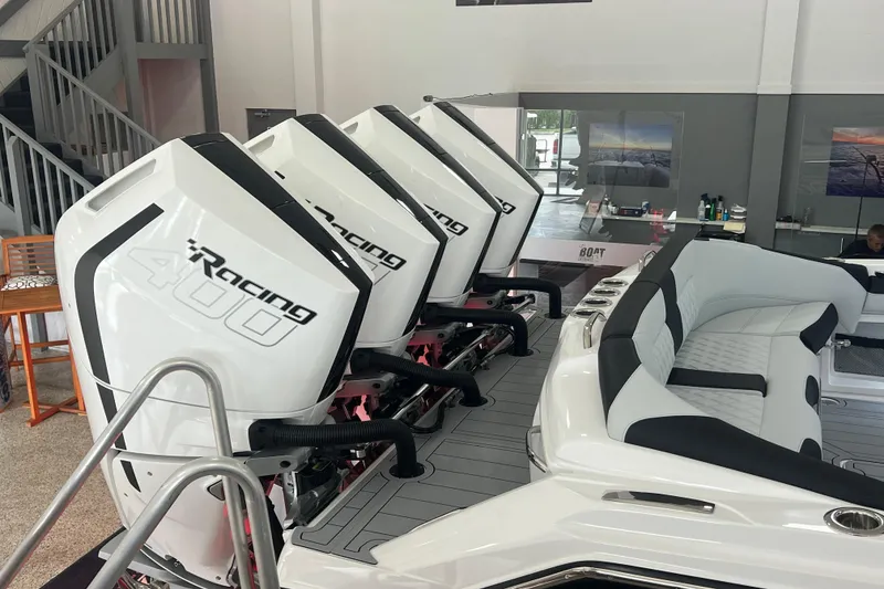 Slide: The Image of 2026 Nor-Tech 390 Sport Center Console with four powerful Racing 400 engines. - 3
