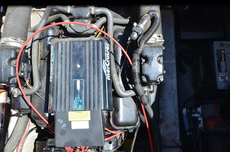 Slide: The Image of Engine compartment of a 1989 Carver Santego 3867 with MerCruiser components. - 39