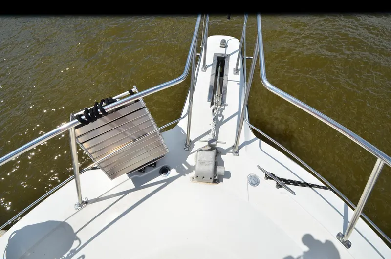Slide: The Image of Bow view of 1989 Carver Santego 3867 yacht with stainless steel railings. - 8