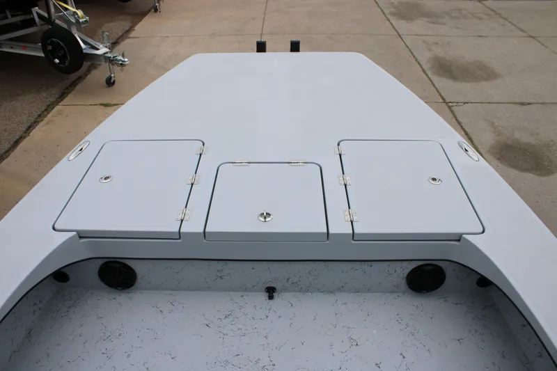 Slide: The Image of 2025 Freedom Boats 23' Warrior deck with storage compartments. - 14