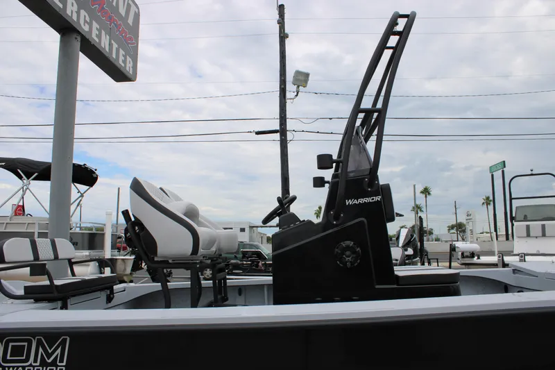 Slide: The Image of 2025 Freedom Boats 23' Warrior with sleek design and modern seating. - 22
