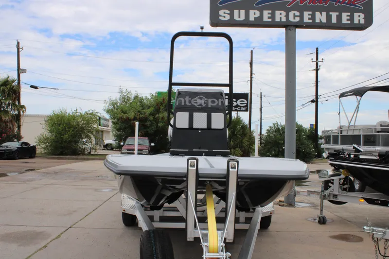 Slide: The Image of 2025 Freedom Boats 23' Warrior on trailer at marine supercenter. - 23