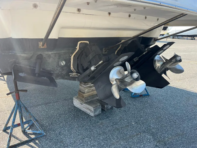 Slide: The Image of 2004 Cruisers Yachts 320 Express propellers and stern on dry dock. - 9