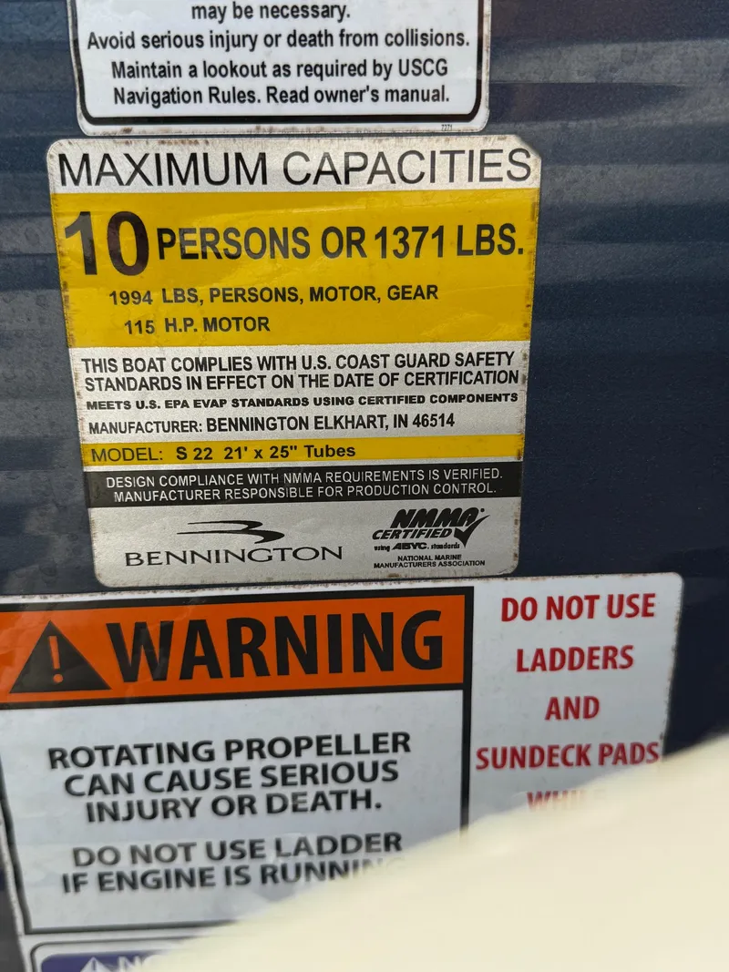 Slide: The Image of 2016 Bennington 22 SX capacity label, 10 persons or 1371 lbs, safety warnings included. - 15