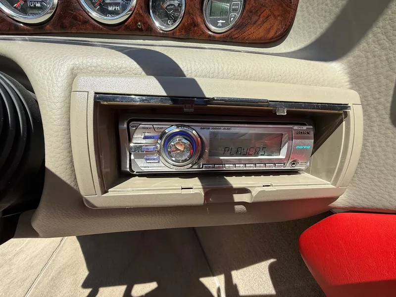 Slide: The Image of Crownline 18 SS 2012 dashboard with Sony marine stereo and gauges. - 16