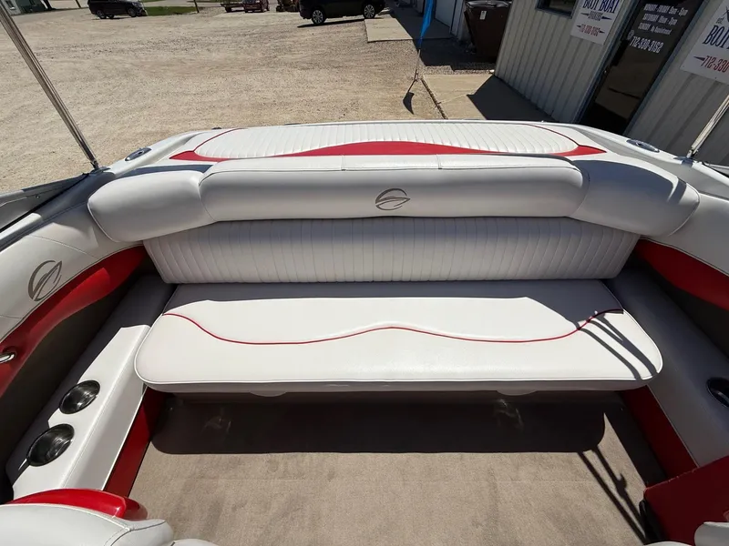 Slide: The Image of 2012 Crownline 18 SS boat interior with white and red seating. - 20