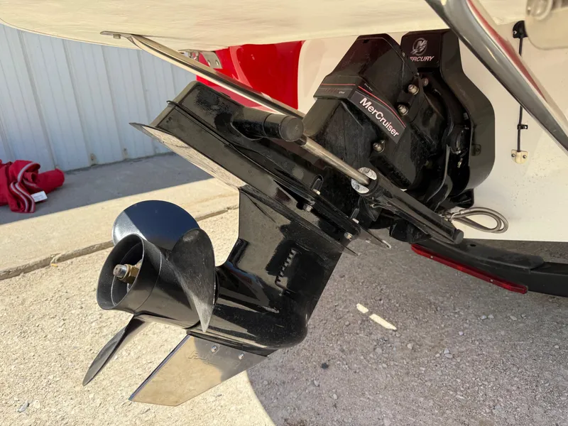 Slide: The Image of 2012 Crownline 18 SS boat with MerCruiser outboard motor, close-up view. - 6