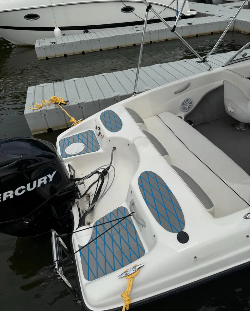 Slide: The Image of 2013 Bayliner 160 Bowrider with Mercury engine docked at marina. - 6