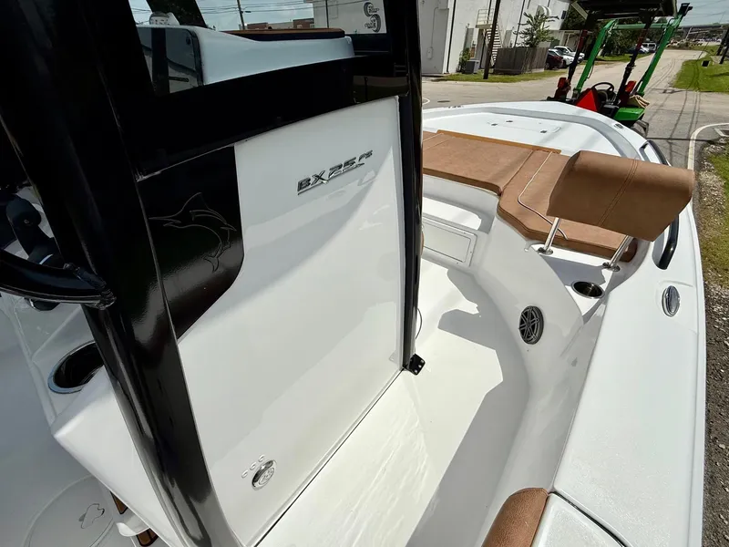 Slide: The Image of 2026 Sea Hunt BX 25 FS boat interior with seating and console details. - 17