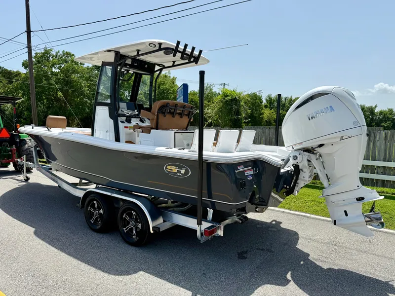 Slide: The Image of 2026 Sea Hunt BX 25 FS boat on trailer with Yamaha outboard motor. - 2