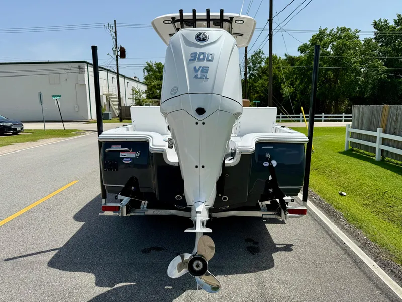 Slide: The Image of 2026 Sea Hunt BX 25 FS boat with powerful outboard motor on a trailer. - 3