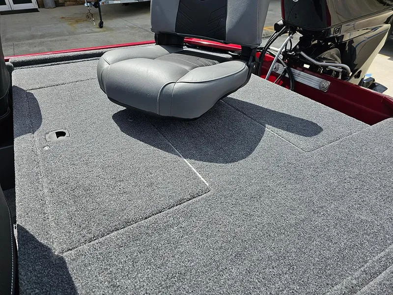 Slide: The Image of 2026 Tracker Bass Tracker Classic XL boat seat on carpeted deck. - 10