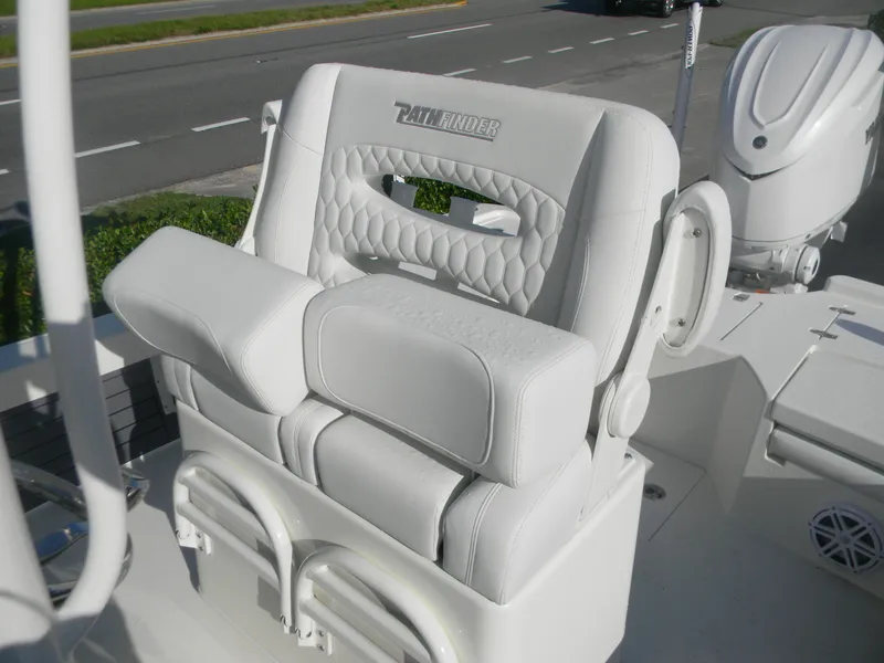 Slide: The Image of 2026 Pathfinder 2500 Hybrid boat seat with white upholstery and modern design. - 5