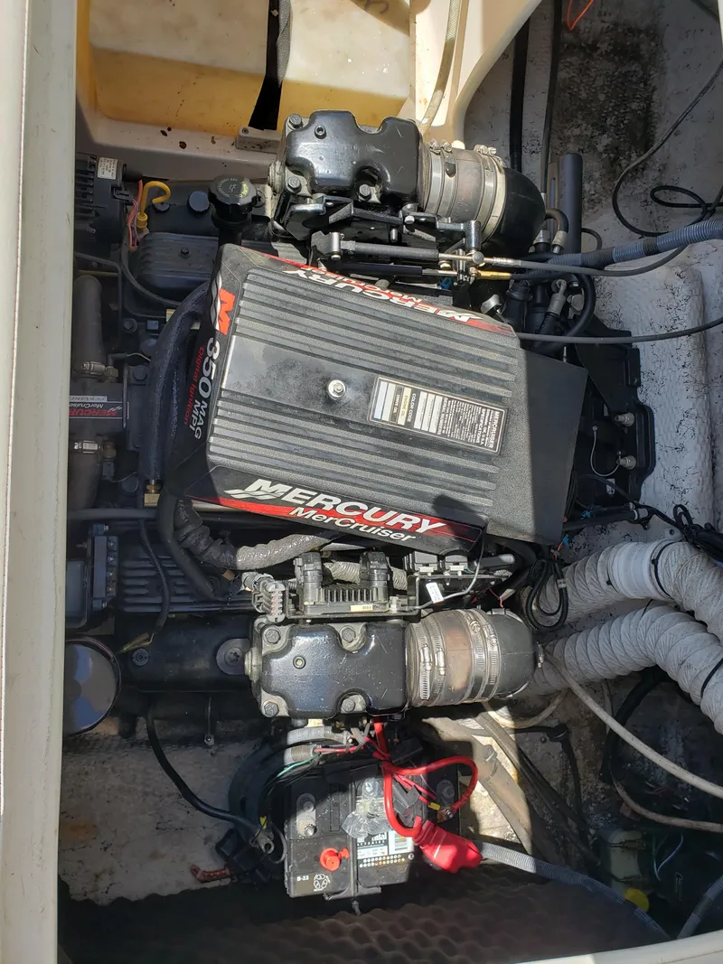Slide: The Image of 2005 Rinker 232 Captiva Cuddy engine compartment with Mercury MerCruiser 350 MAG engine. - 3