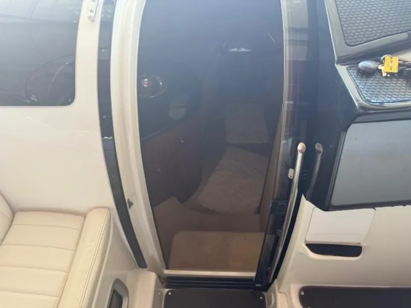 Slide: The Image of Interior view of a 2001 Cobalt 360 boat cabin entrance with seating. - 15