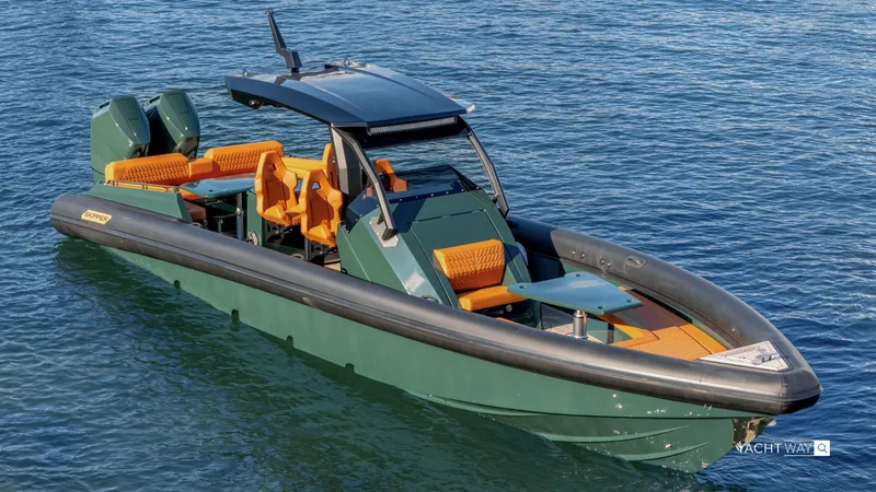 Slide: The Image of 2025 Skipper-BSK 38NC boat with sleek design and vibrant orange seating on water. - 10
