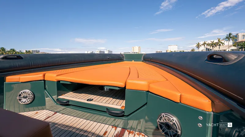 Slide: The Image of Luxurious 2025 Skipper-BSK 38NC yacht with orange seating and sleek design. - 17
