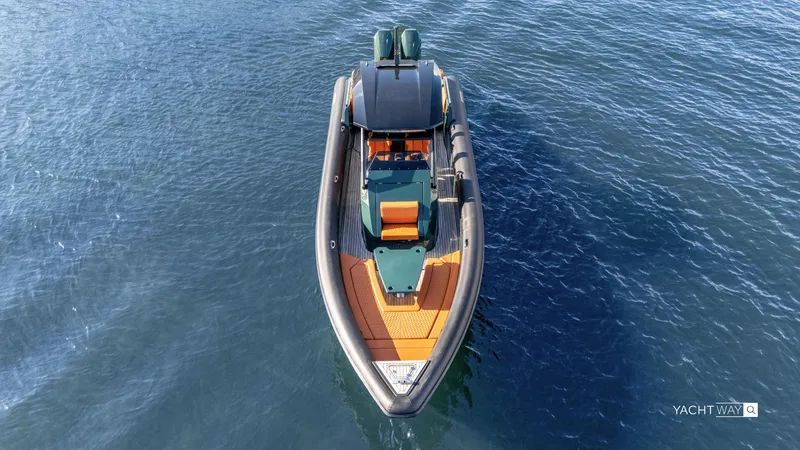 Slide: The Image of Aerial view of 2025 Skipper-BSK 38NC boat on open water. - 18