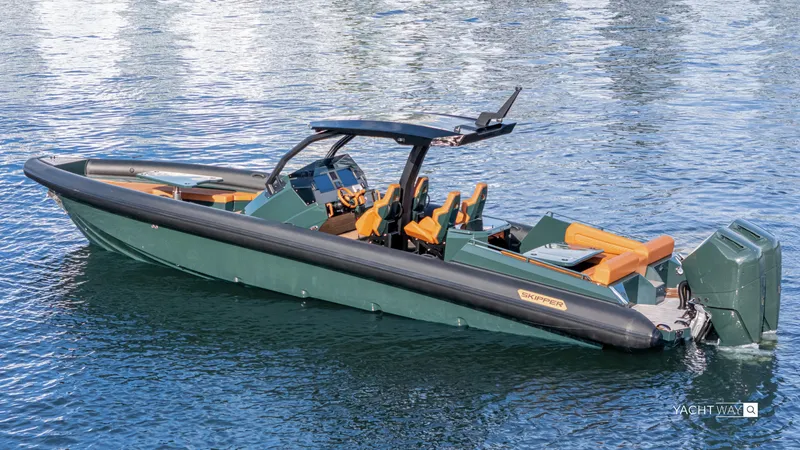 Slide: The Image of 2025 Skipper-BSK 38NC boat on water, featuring sleek design and modern amenities. - 4