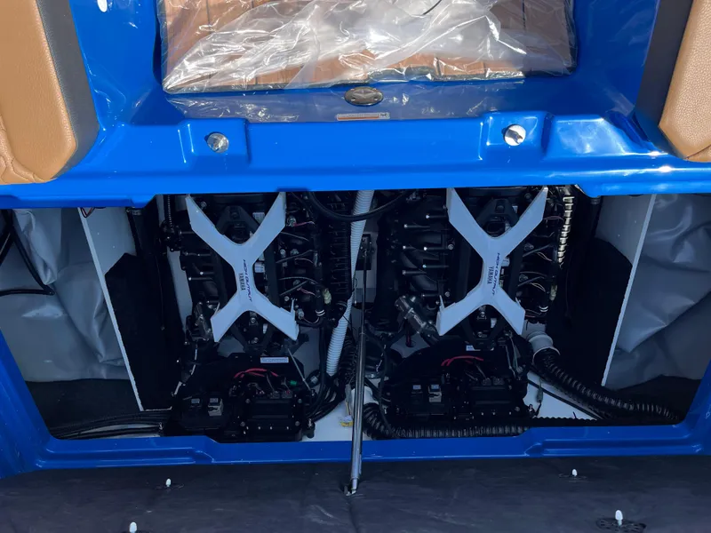 Slide: The Image of Engine compartment of 2025 Yamaha Boats 222XD, showcasing dual engines and components. - 4