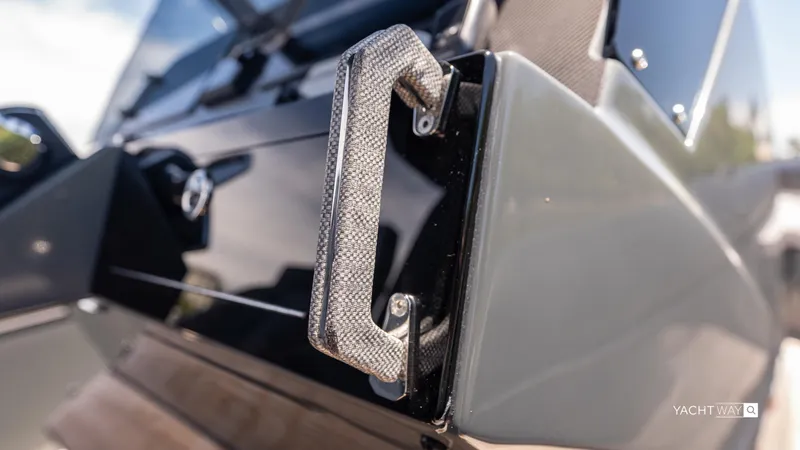 Slide: The Image of Close-up of Skipper-BSK 38NC 2025 boat handle, showcasing sleek design and craftsmanship. - 38