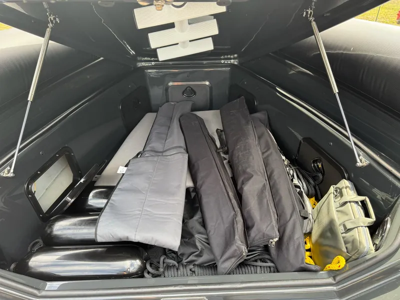 Slide: The Image of Storage compartment of 2025 Skipper-BSK 38NC boat with equipment and gear. - 16