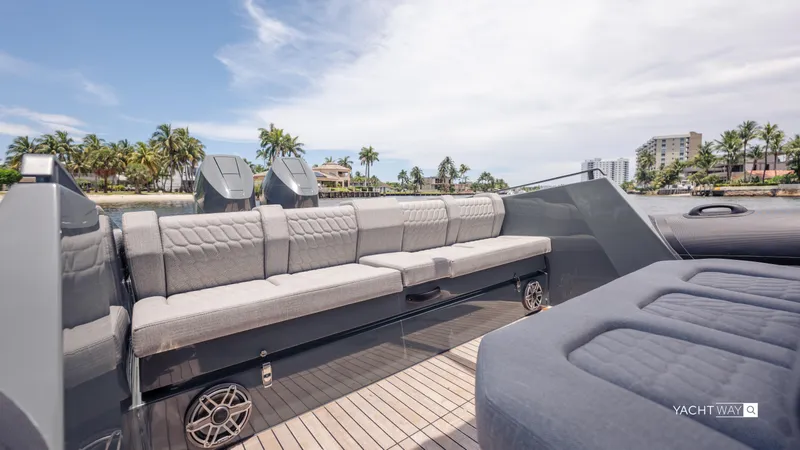 Slide: The Image of Luxurious seating on 2025 Skipper-BSK 38NC yacht, with scenic waterfront view. - 20