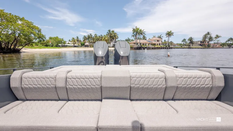 Slide: The Image of Luxury Skipper-BSK 38NC boat interior with scenic waterfront view, 2025 model. - 21