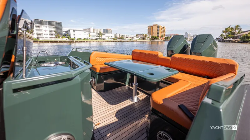 Slide: The Image of Luxurious 2025 Skipper-BSK 38NC boat with stylish seating and modern amenities on a scenic waterfront. - 21