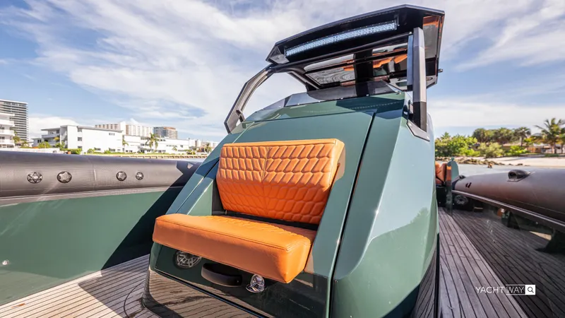 Slide: The Image of Luxury Skipper-BSK 38NC boat, 2025 model, with orange seating and sleek design. - 27