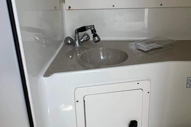 Slide: The Image of 2003 Hydra-Sports Vector 2800 WA boat interior sink and countertop. - 13