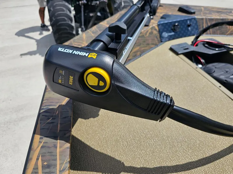 Slide: The Image of Minn Kota trolling motor on 2026 G3 Sportsman 1710 boat, close-up view. - 19