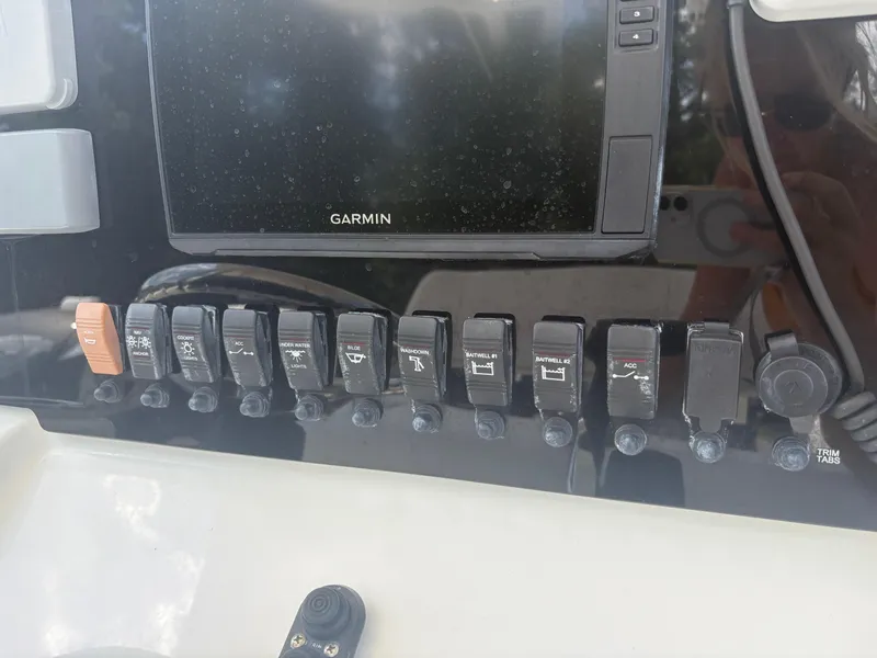 Slide: The Image of Control panel of a 2021 Parker 2300 Special Edition boat with Garmin display. - 18