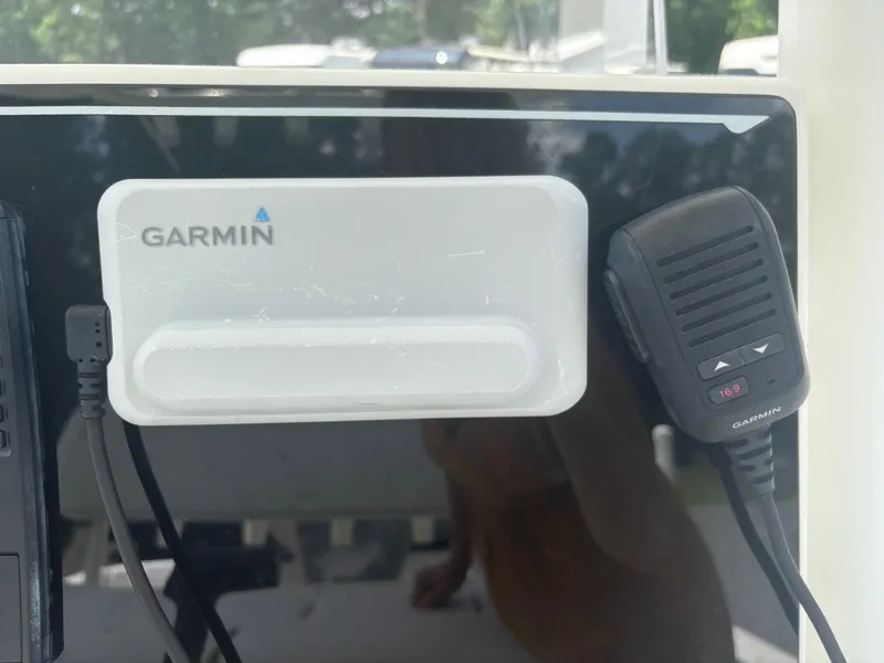 Slide: The Image of Garmin marine electronics on a 2021 Parker 2300 Special Edition boat dashboard. - 19