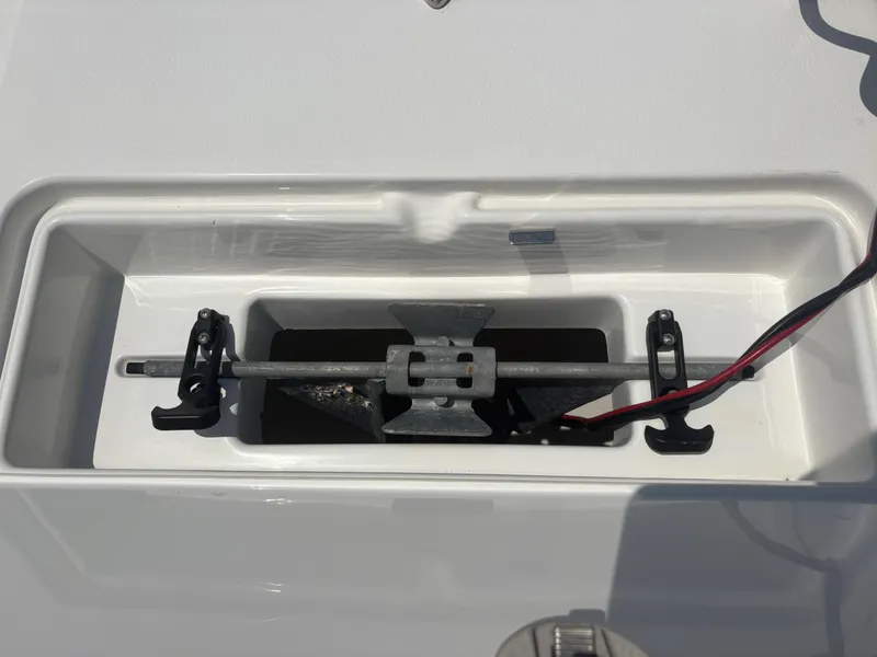 Slide: The Image of Anchor compartment of 2021 Parker 2300 Special Edition boat, featuring secure storage and wiring. - 21