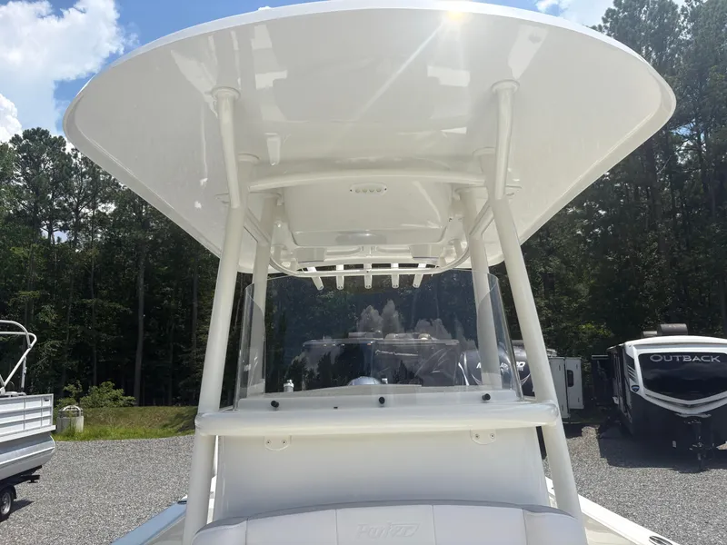 Slide: The Image of 2021 Parker 2300 Special Edition boat with T-top, parked outdoors. - 22