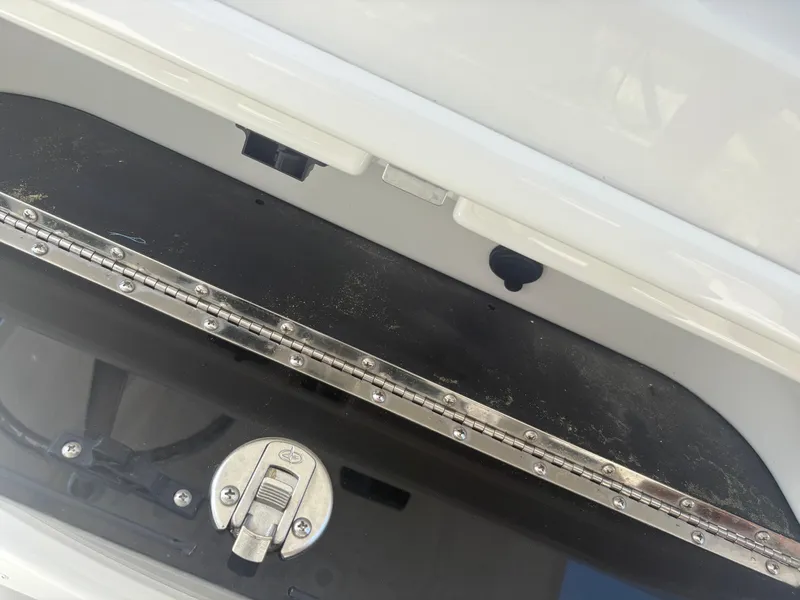 Slide: The Image of 2021 Parker 2300 Special Edition boat hatch with stainless steel hinge and latch. - 25
