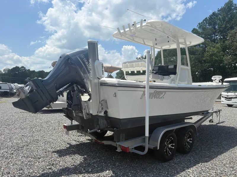 Slide: The Image of 2021 Parker 2300 Special Edition boat on trailer, featuring Yamaha outboard motor. - 5