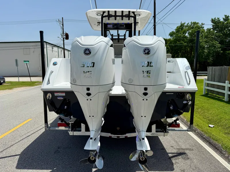 Slide: The Image of 2026 Sea Hunt Gamefish 28 Coffin Box with dual Yamaha 300 V6 outboard engines. - 3