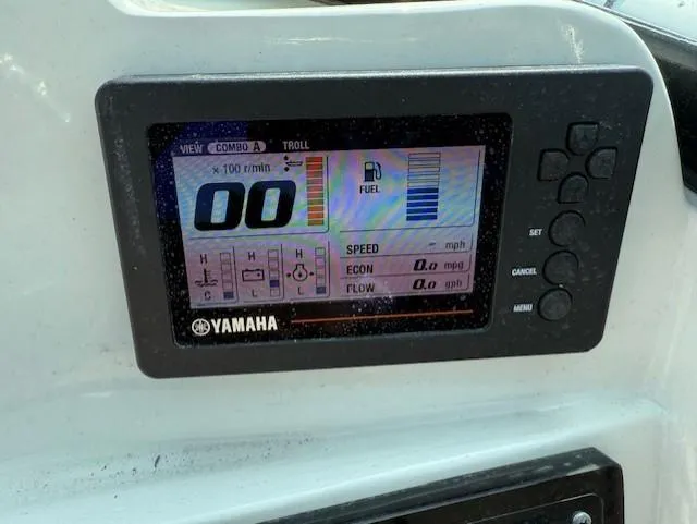 Slide: The Image of Digital display on a 2020 NauticStar 2302 Legacy Dual Console boat showing Yamaha engine metrics. - 16
