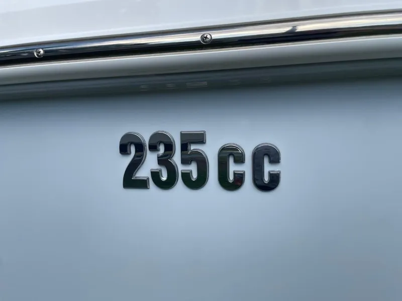 Slide: The Image of Everglades 235 Center Console 2023 boat model emblem on hull. - 10