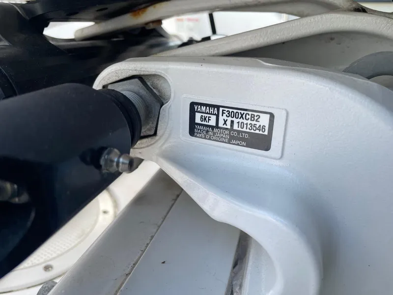 Slide: The Image of Close-up of Yamaha F300XCB2 engine part on 2023 Everglades 235 Center Console boat. - 34