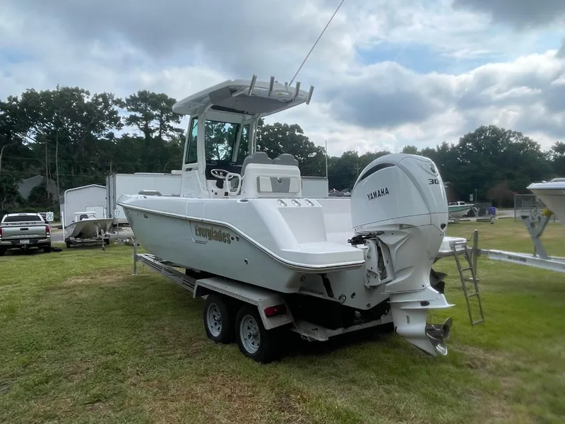 Slide: The Image of 2023 Everglades 235 Center Console boat with Yamaha engine on trailer. - 6